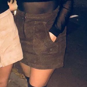 Cheetah print skirt with pocket and zip detail.